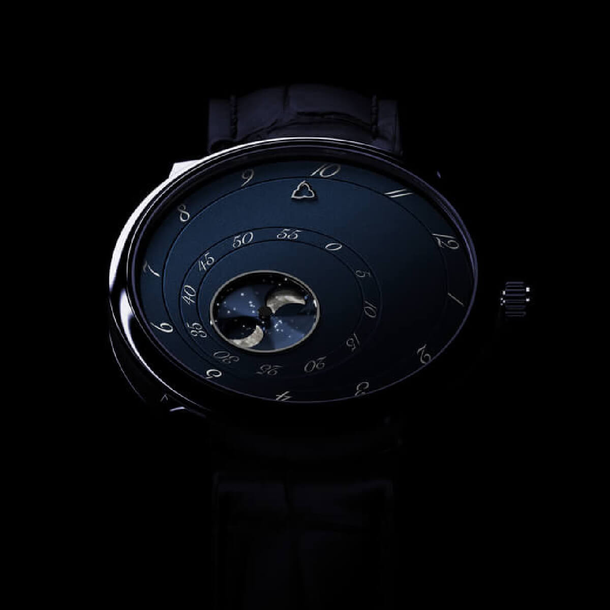 The Les Matinaux L'Heure Exquise Blue watch by Trilobe with moon phase in titanium case.