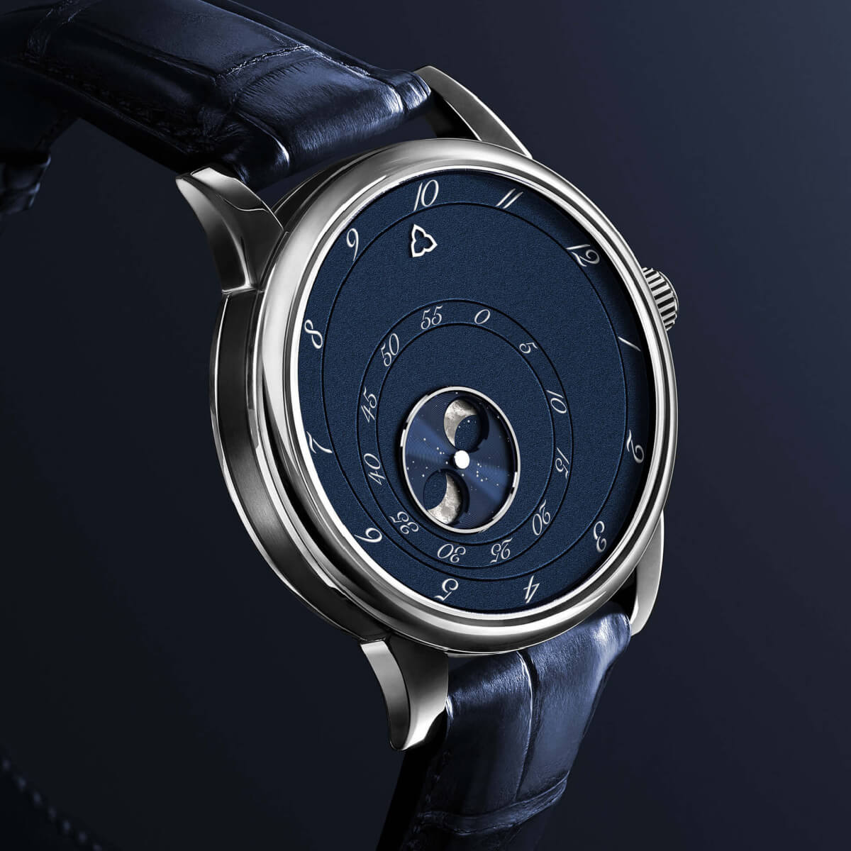 The Les Matinaux L'Heure Exquise Blue watch by Trilobe with moon phase in titanium case.